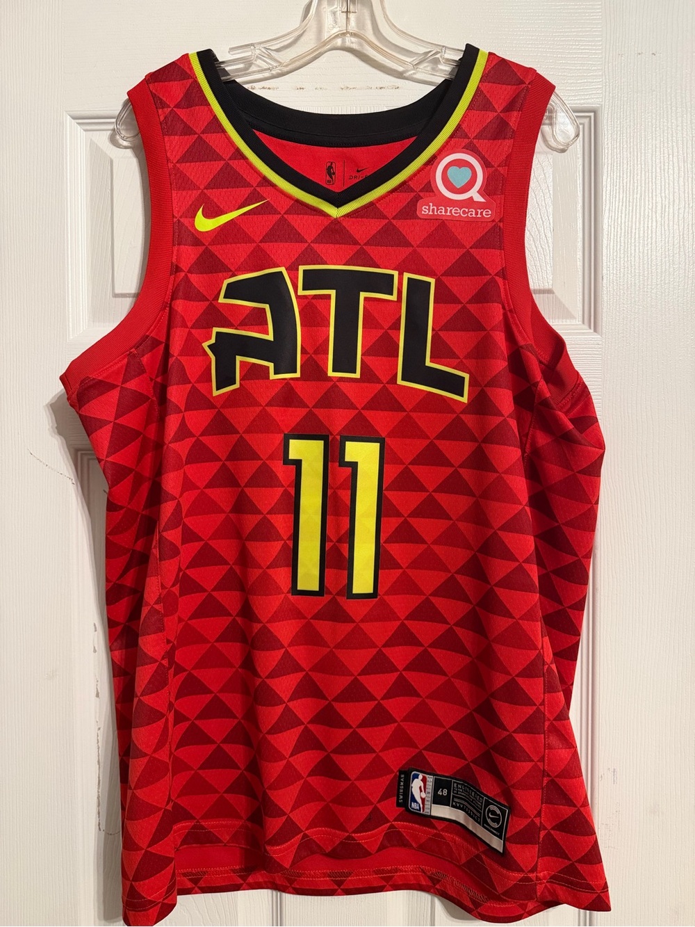 Nike Red Atlanta Hawks Trae Young #11 Basketball Jersey with Yellow Accents